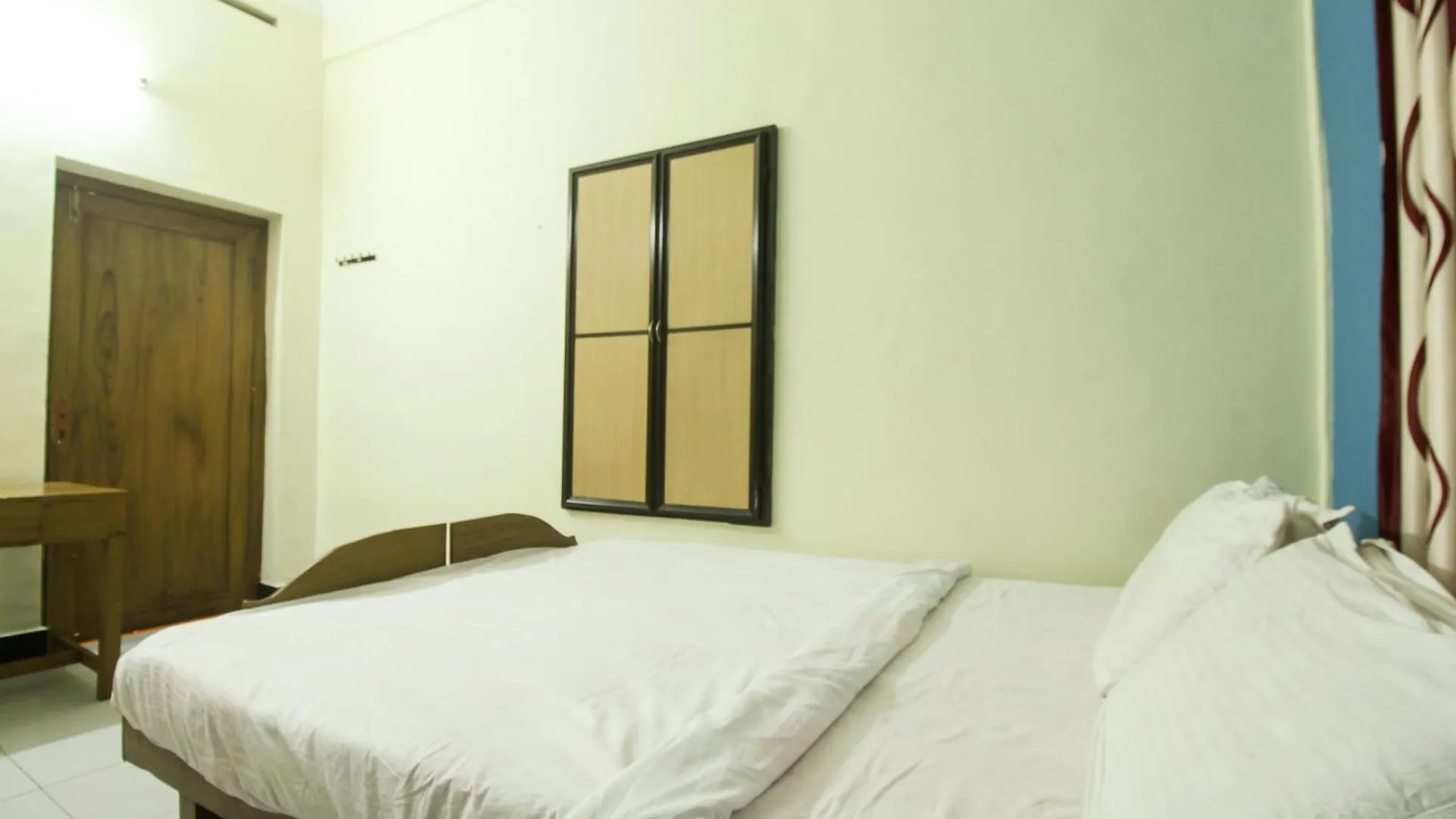 Hotel Spot On Mukkam Tourist Home Kozhikode