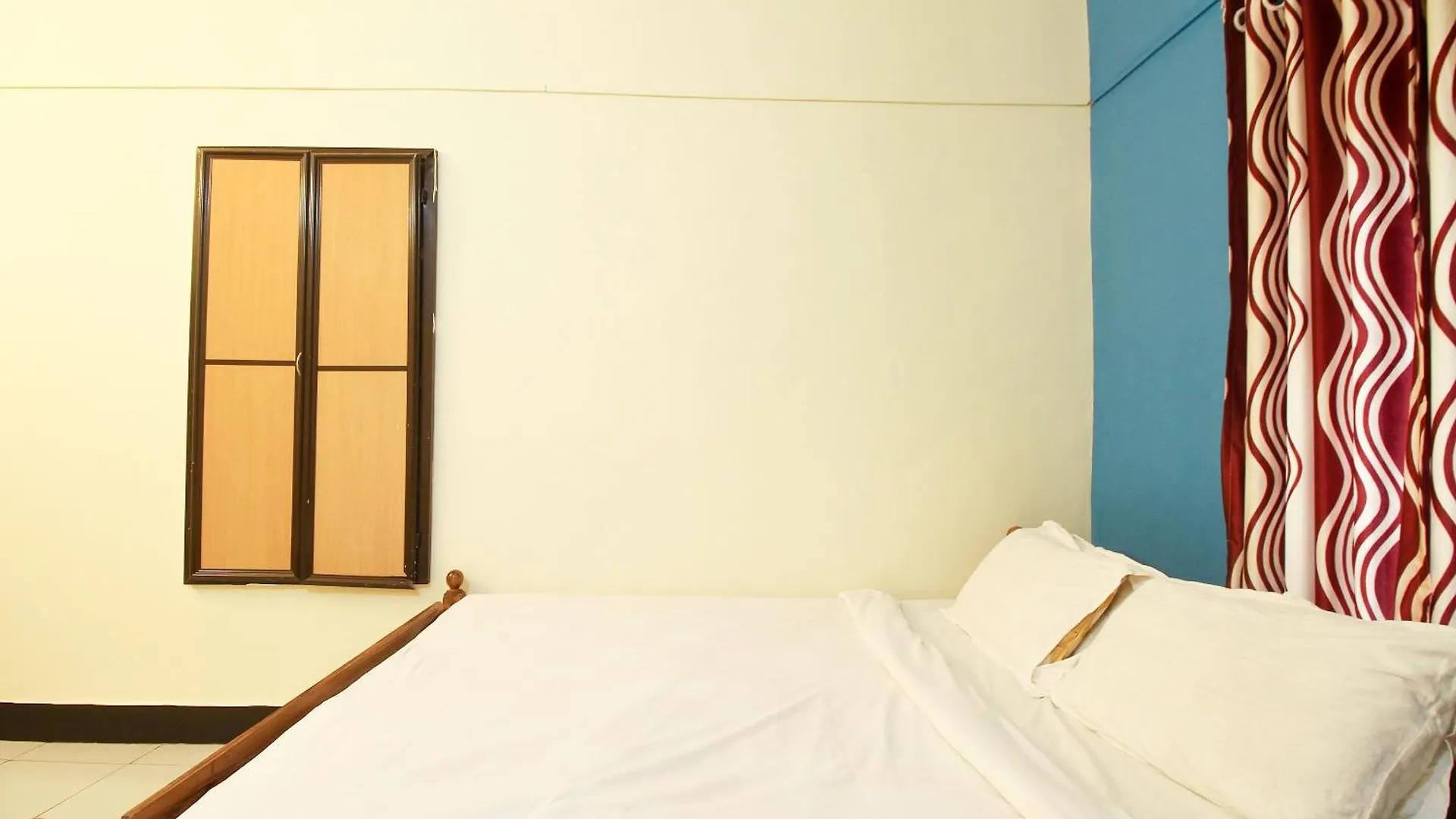 ** Hotel Spot On Mukkam Tourist Home Kozhikode Indie